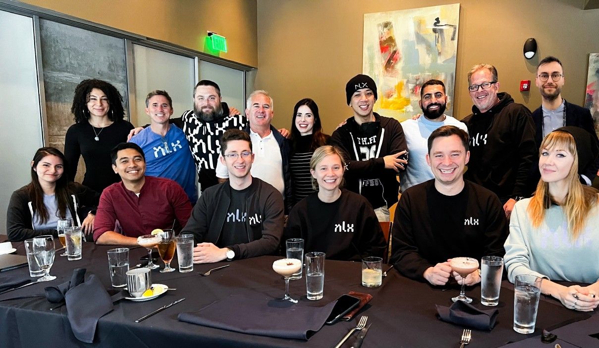 Group of people at a restaurant after eating_corporate retreat_Flok