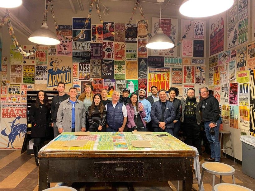 group pf people in poster factory_NLX_Hatch Show Print_Nashville